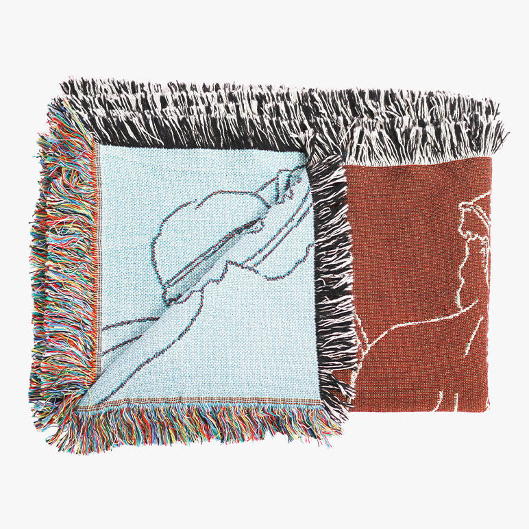 Designer throw blanket with woven design based on Greek mythology