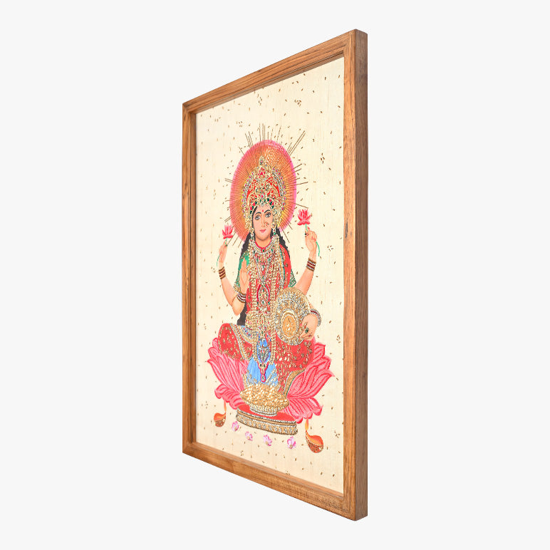 Framed artwork of a deity with intricate details on a white background