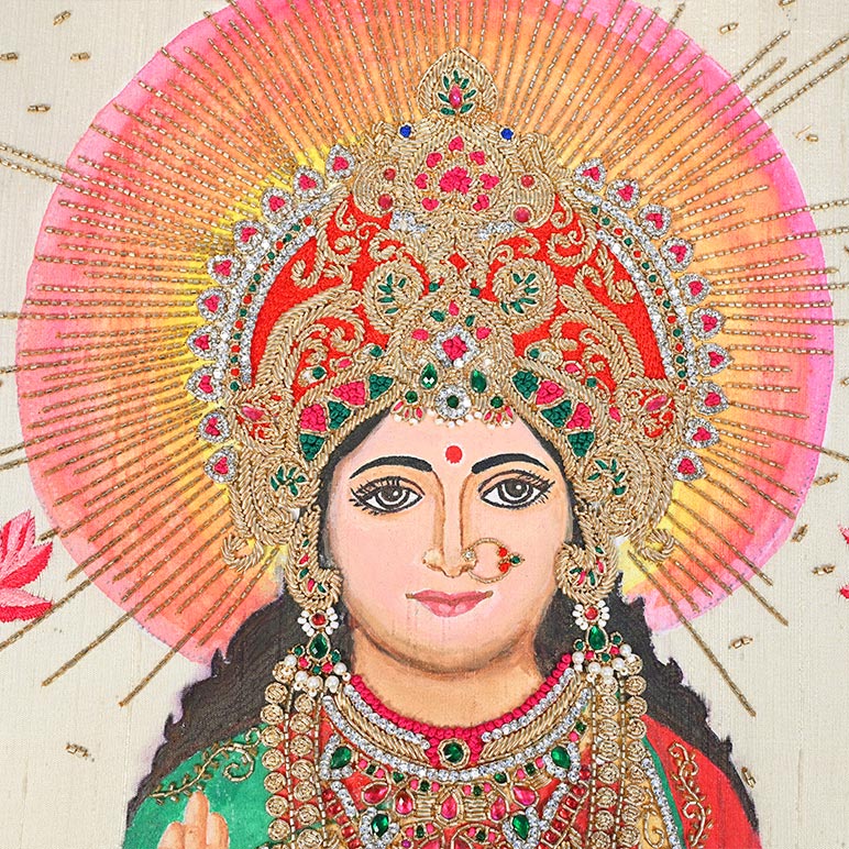 Colorful depiction of a deity with intricate jewelry and a radiant halo.
