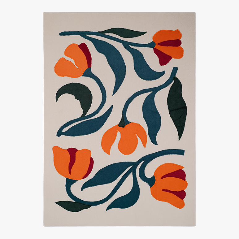 Decorative rug with orange and blue floral pattern on a beige background