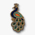 Decorative handmade peacock brooch pin with gold, green, and blue colors on a white background