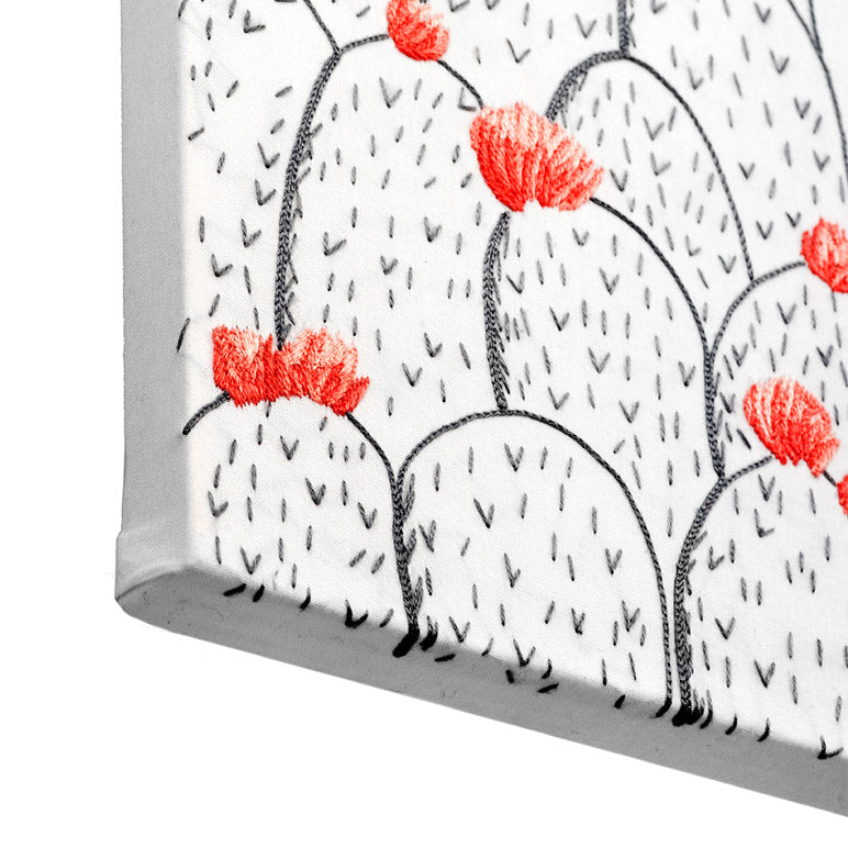 Window blind with cactus and flower pattern on a white background