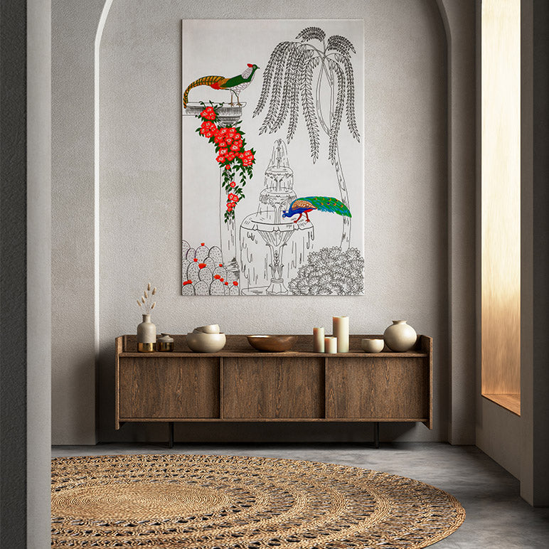 Decorative wall art with birds and flowers above a wooden console table in a room.