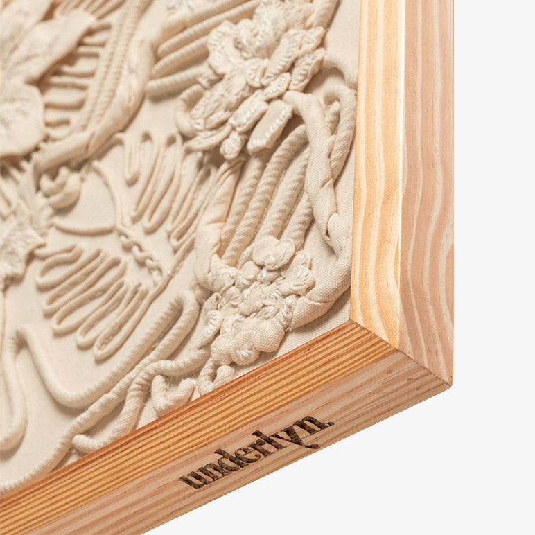 Wooden block with embossed design and &