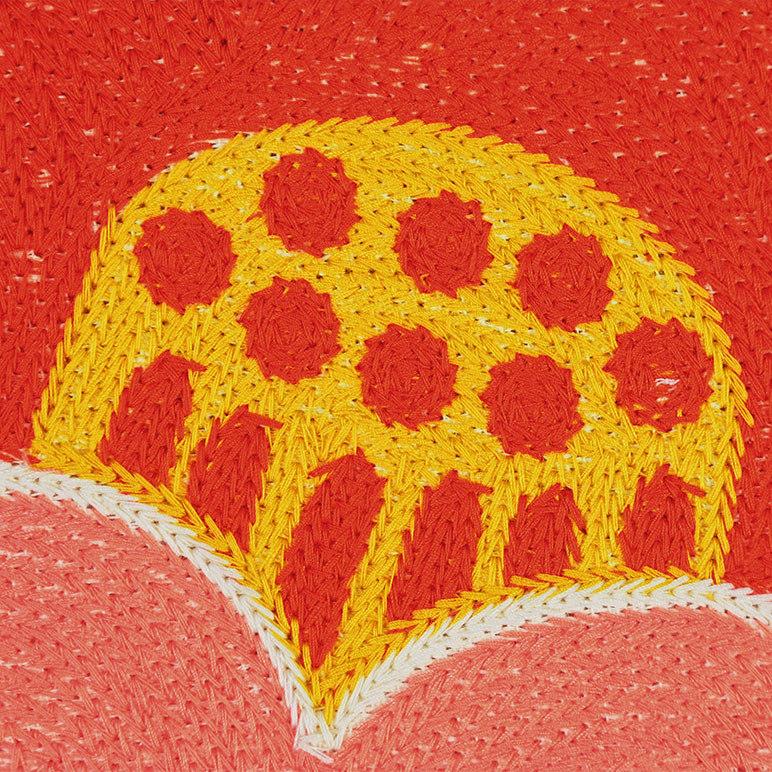Embroidered design of a slice of pizza with red cheese on a red background