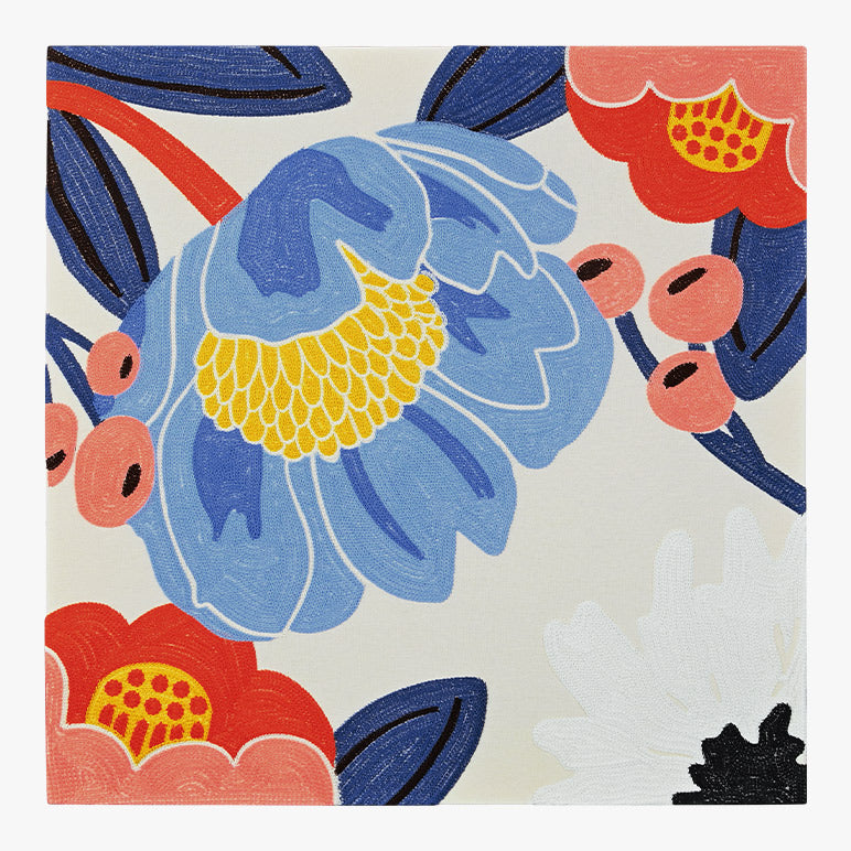 Colorful floral design with blue, red, and yellow flowers on a beige background