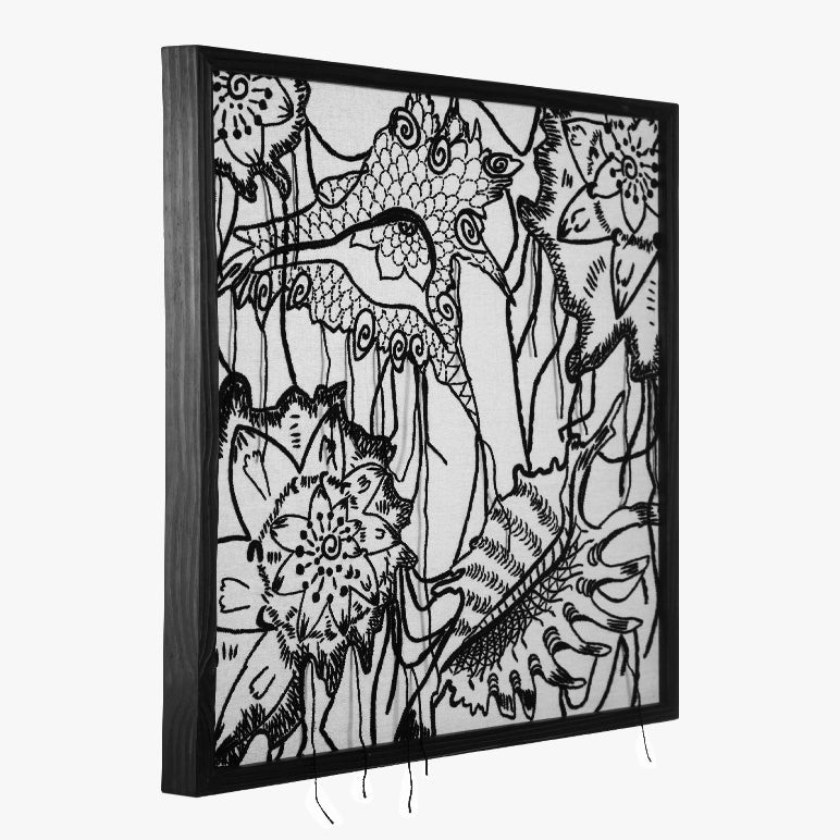 Black and white abstract artwork with floral and animal elements in a black frame.