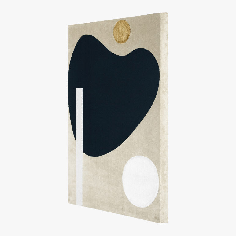 Abstract art piece with black, white, and gold shapes on a beige background