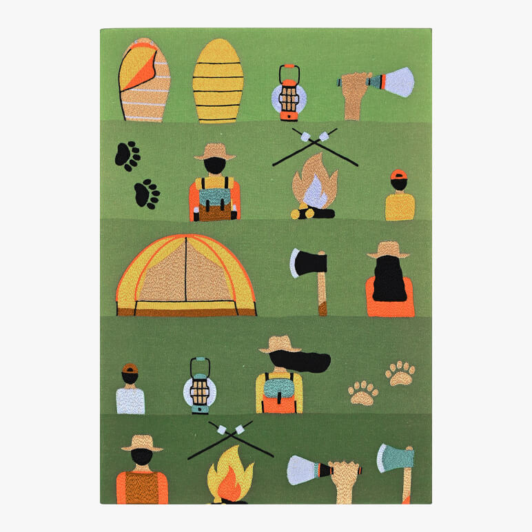 Embroidered pattern with camping-themed designs on a green background