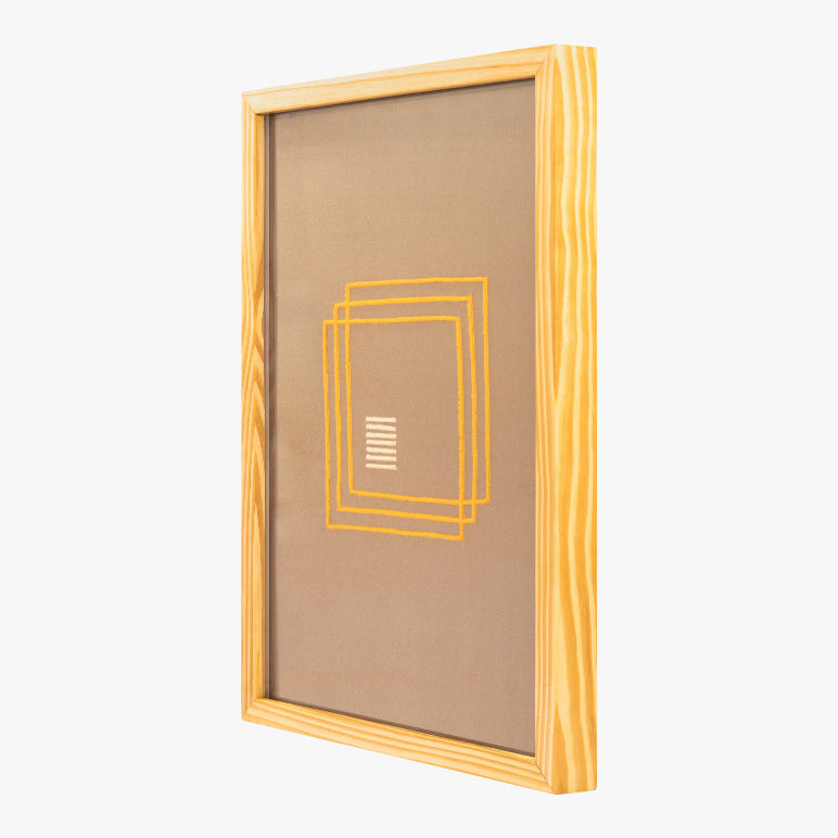 Wooden picture frame with geometric design on a white background