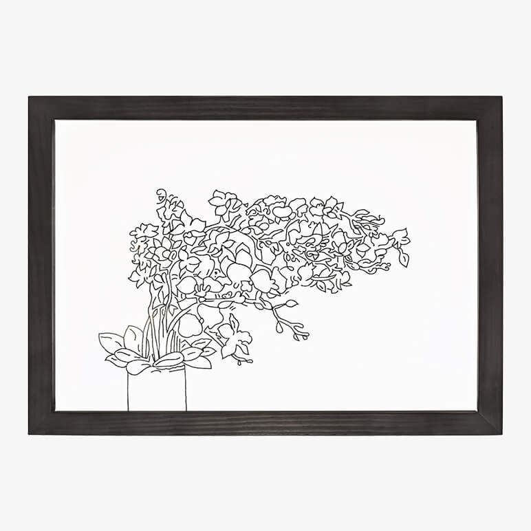 Framed black and white line drawing of flowers on a white background