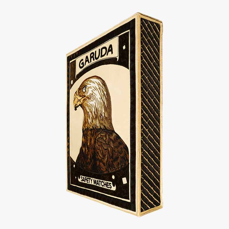 Matchbox with an eagle illustration and &