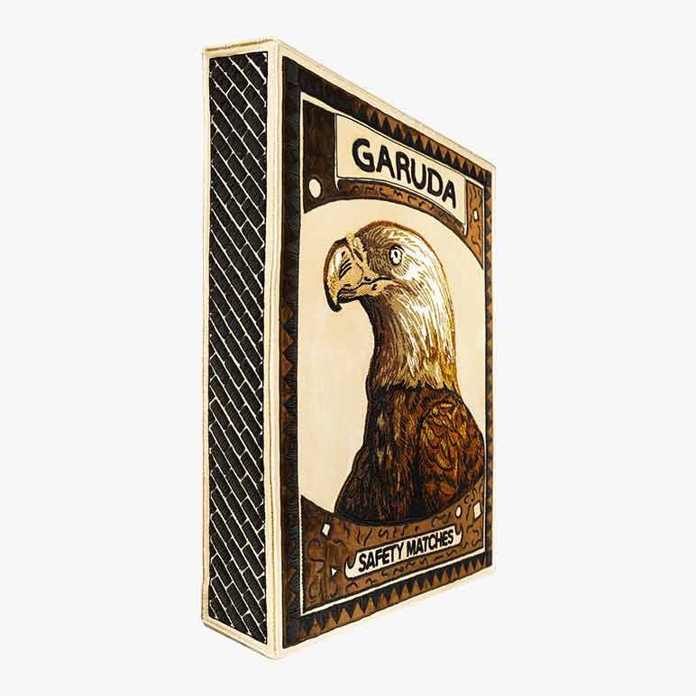 Matchbox with an eagle design and &