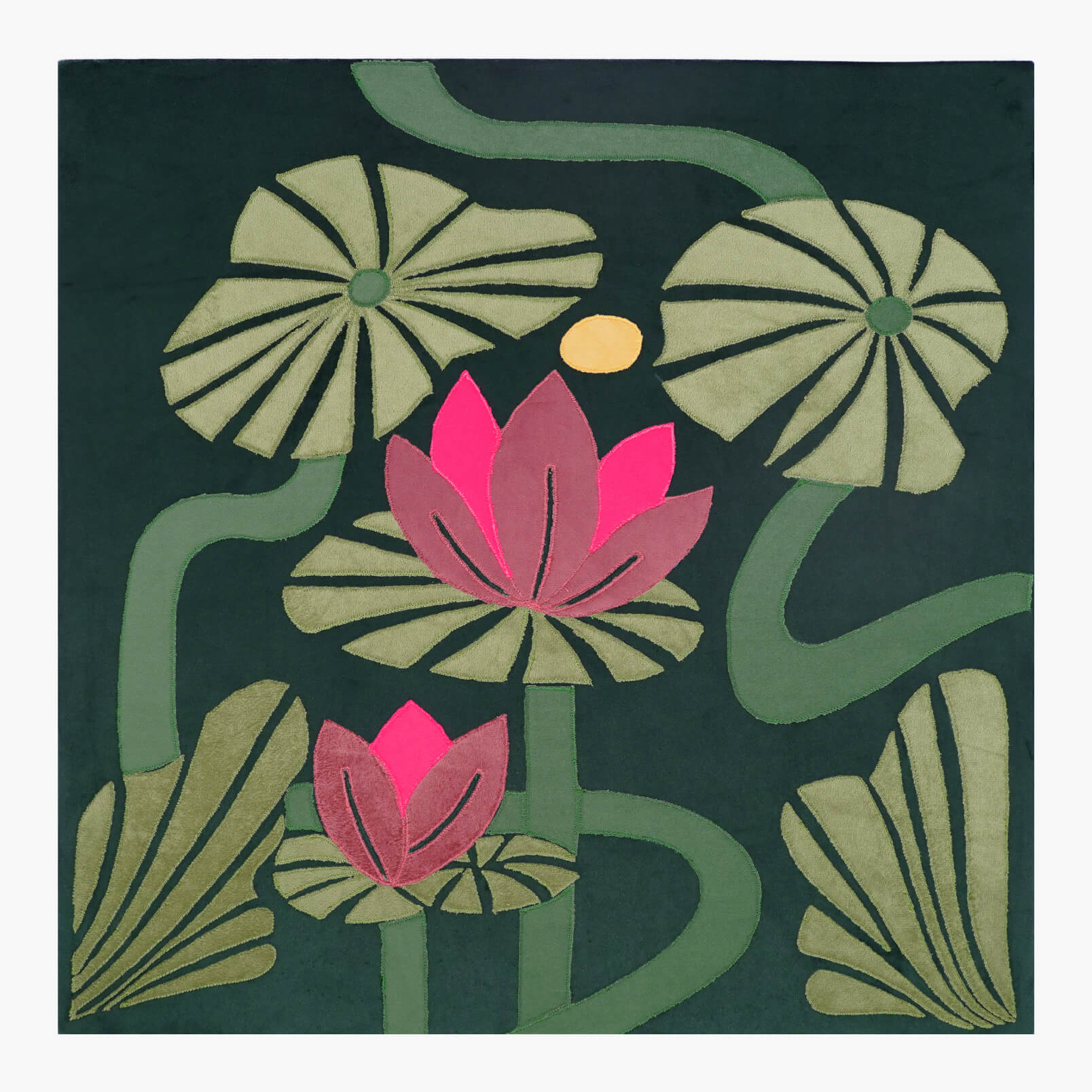 Decorative fabric with pink lotus flowers and green leaves on a dark background