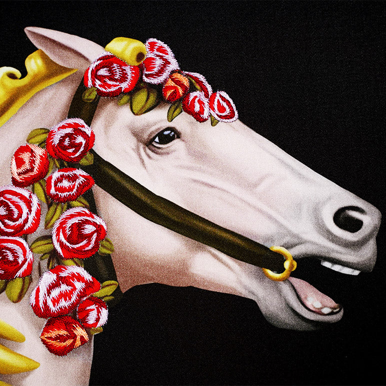 Horse head with floral wreath and bridle on a black background