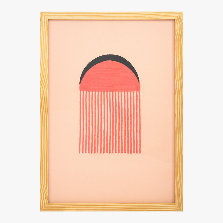 Framed artwork with a geometric design on a peach background