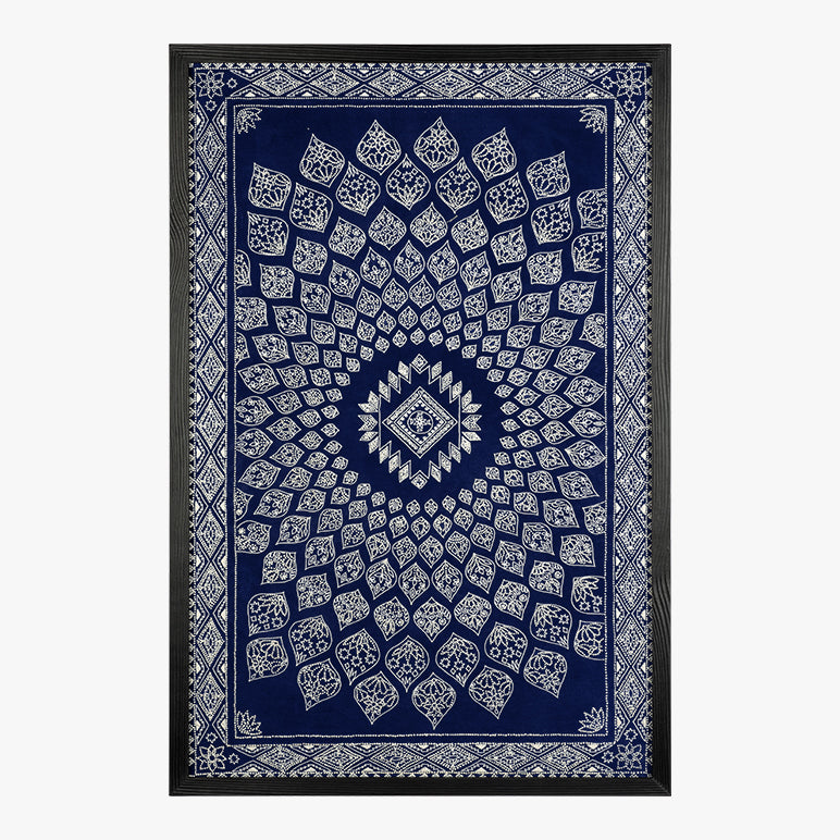 Decorative blue and white patterned tapestry with a geometric design on a plain background