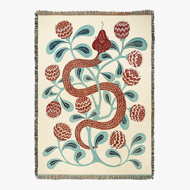 Decorative cotton blanket with a snake design on a beige background
