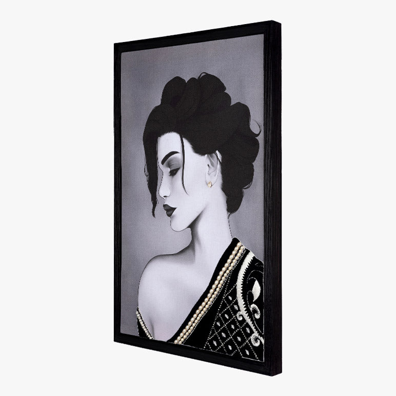 Framed artwork of a stylized woman&
