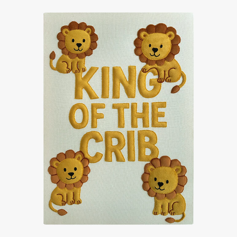 embroidered kids wall art featuring four lions with the words king of the crib at the center