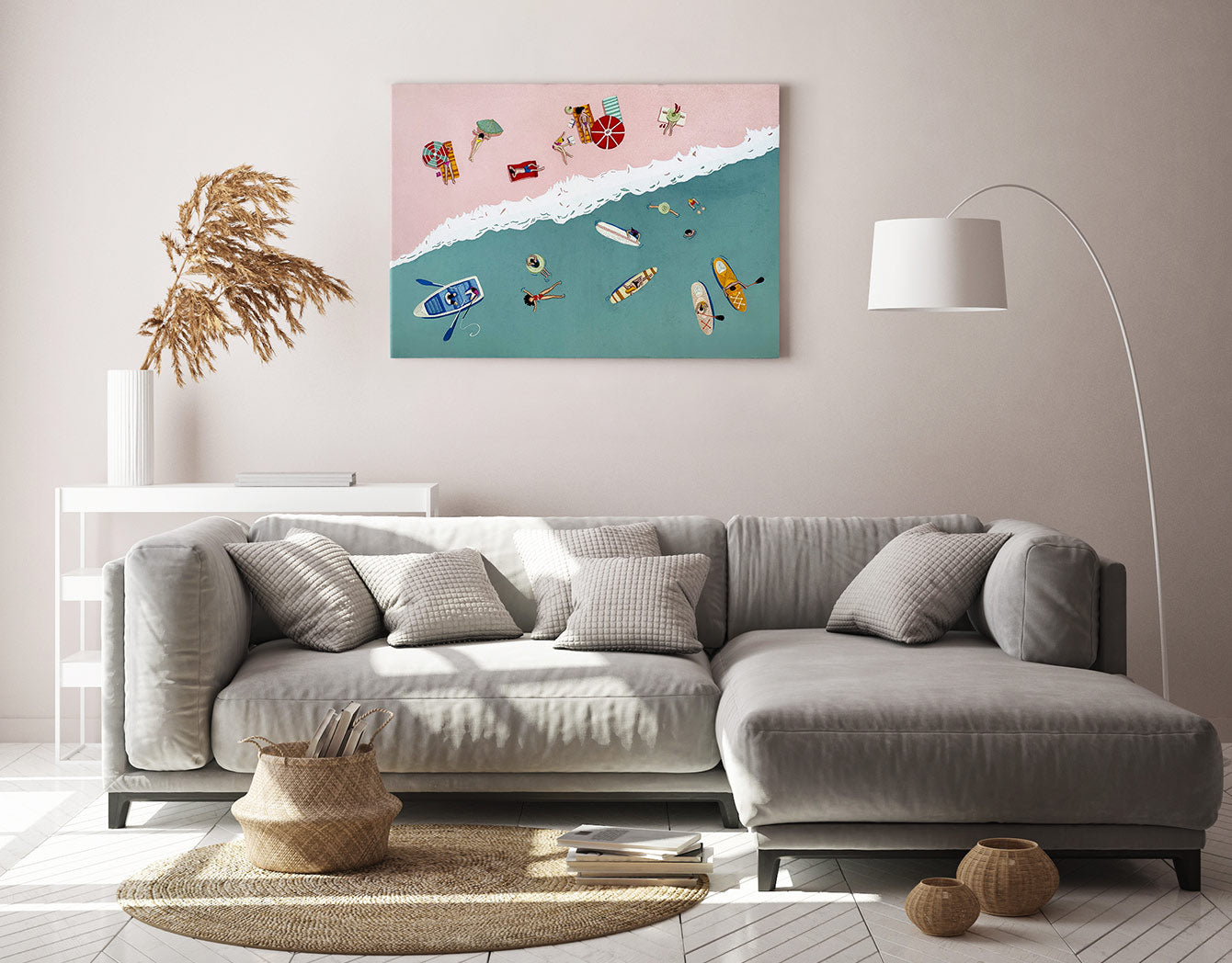 Living room with a gray sofa, decorative pillows, and a colorful wall art piece.