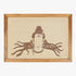 Framed artwork of a stylized face with long hair on a beige background