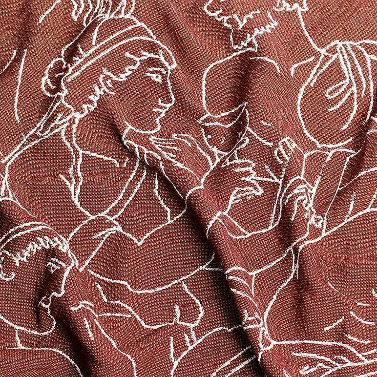 Brown woven designer throw blanket with white line drawings of ancient Greeks