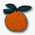 Decorative handmade beaded orange fruit with green leaves brooch pin on a white background