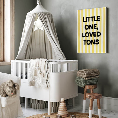 Nursery room with white crib, canopy, and decorative art on a gray wall.