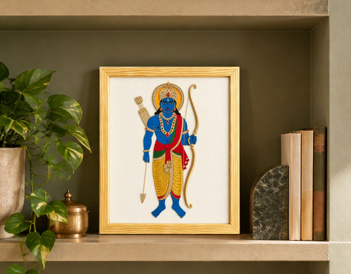 Lord Ram embroidered artwork staged in a muted olive bookshelf