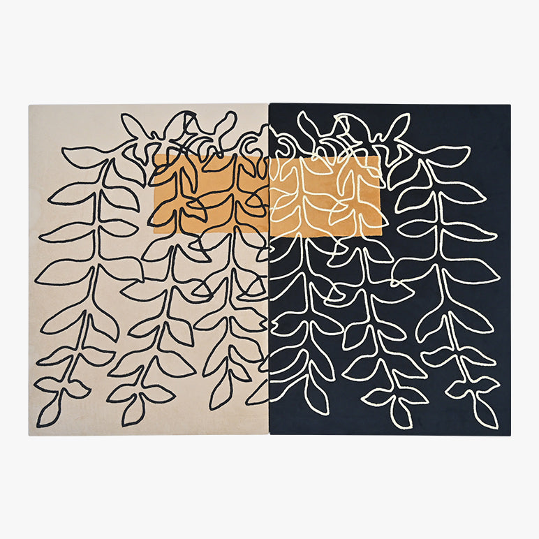 Two abstract art prints with leaf patterns on beige and black backgrounds