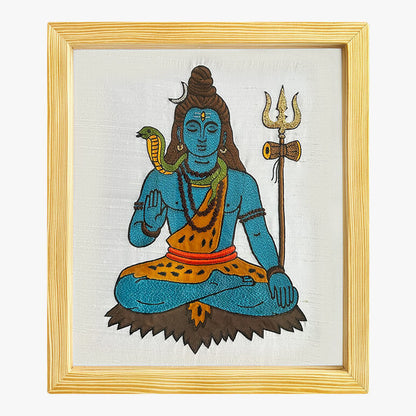 Framed artwork of Lord Shiva, a Hindu deity with a trident and snake, on a white background.