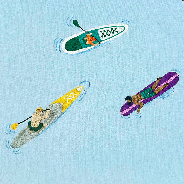 Embroidered art of three people on different types of watercraft against a light blue background