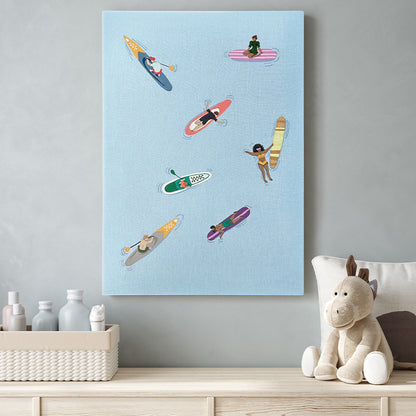 Canvas print with colorful illustrations of people on surfboards and kayaks hanging on a wall.