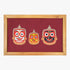 Decorative wall art with three colorful masks on a red background, framed in wood.