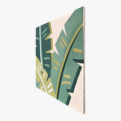 Notebook with a tropical leaf design on a white background