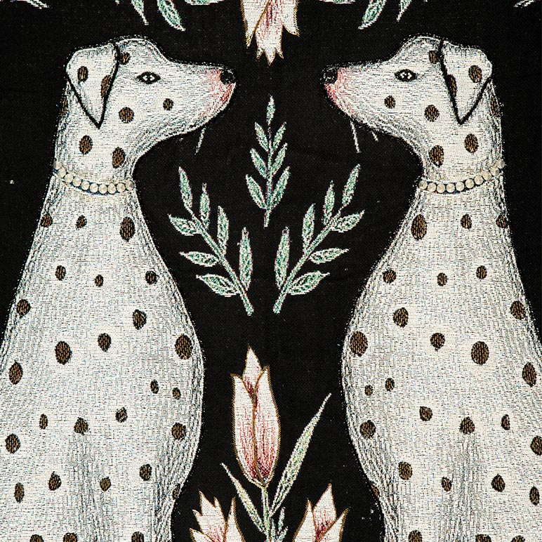 Two dalmatian dogs with floral elements 