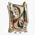 Decorative throw blanket with abstract art design held up
