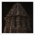 Decorative wooden carvings on a black background