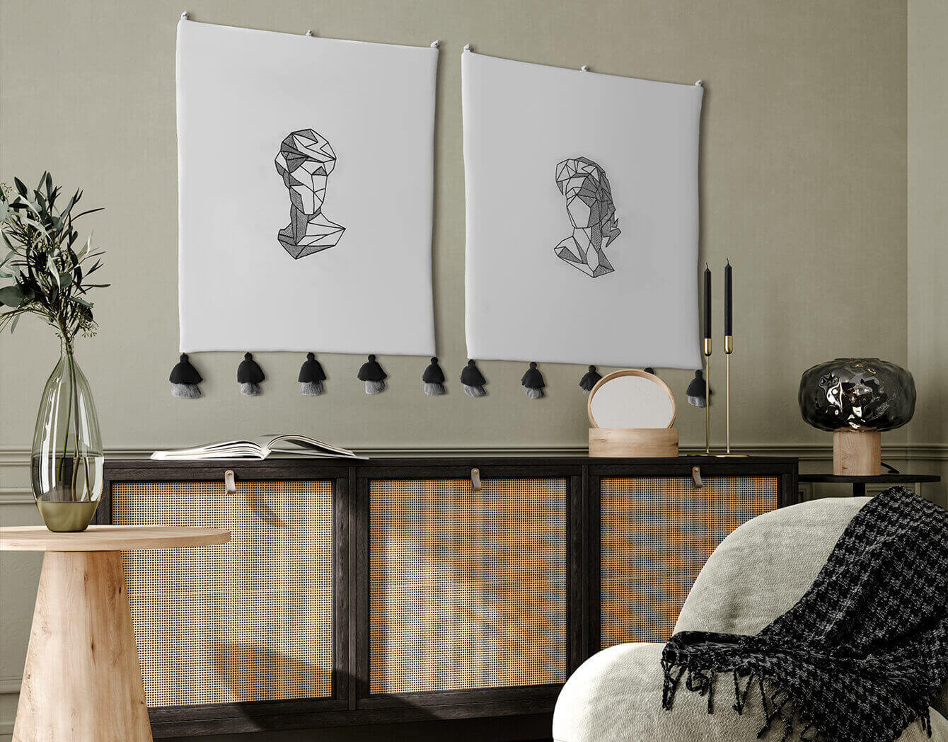 Abstract design tapestries showing two figures displayed in a modern green room