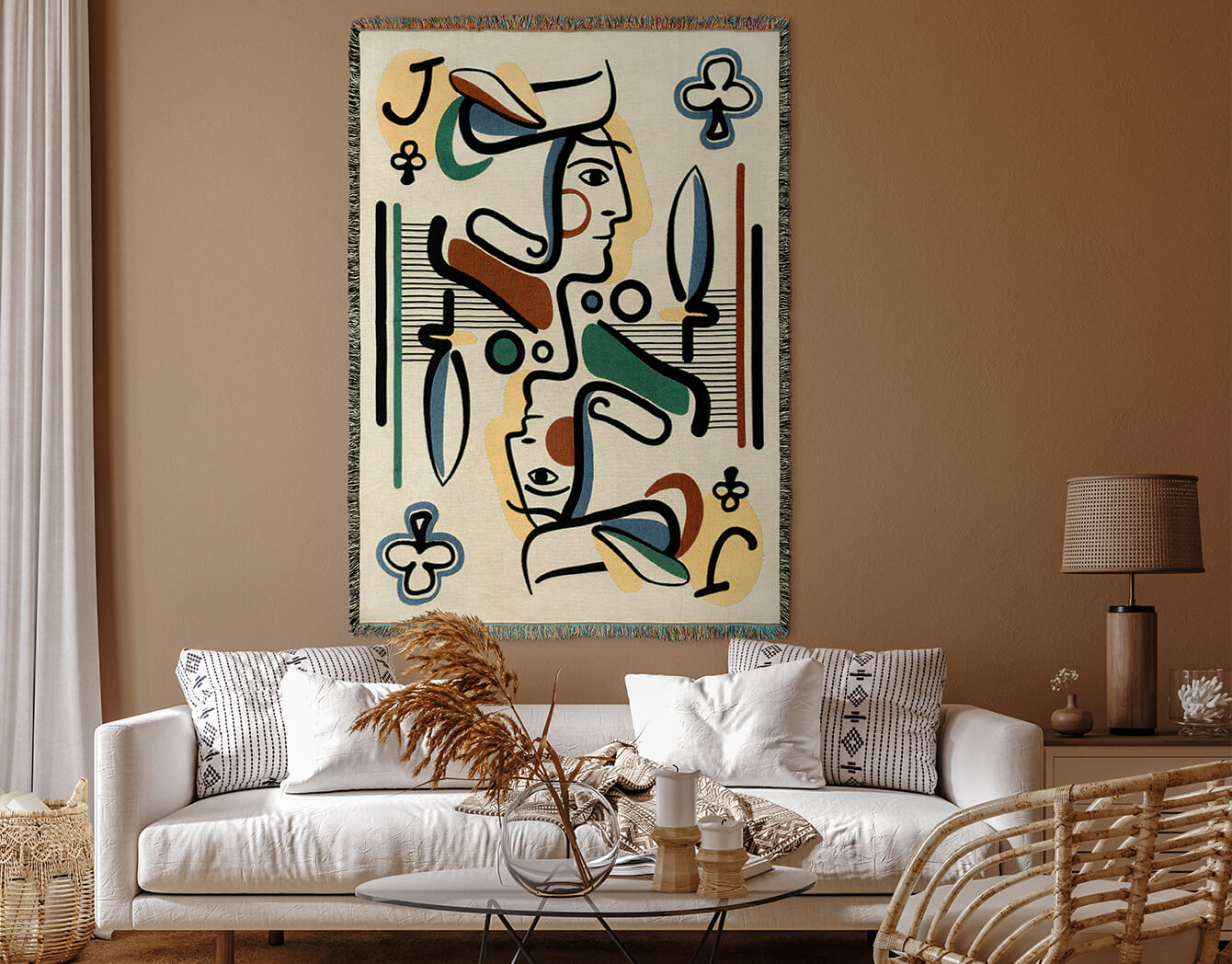 Abstract tapestry hanging above a sofa in a living room