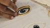 Process video showcasing the making of an evil eye textile artwork