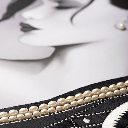 Pearl belt on a mannequin with a blurred background