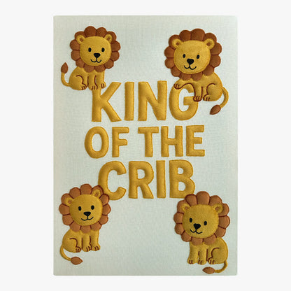 embroidered kids wall art featuring four lions with the words king of the crib at the center