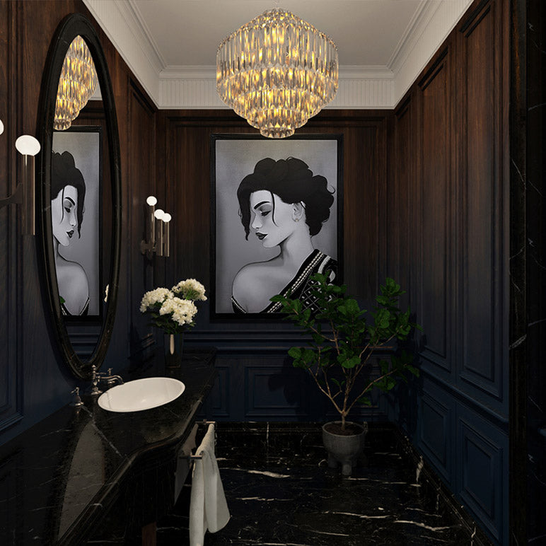 Luxurious bathroom with dark wood paneling, a chandelier, and artistic wall decorations.