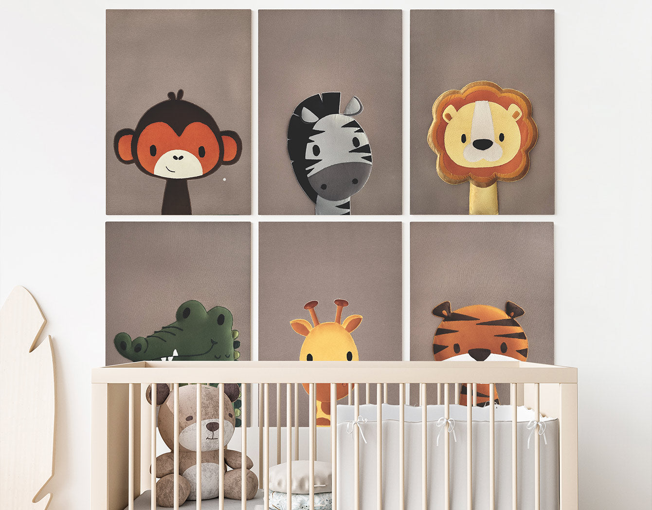 Children's room with animal-themed wall art above a crib