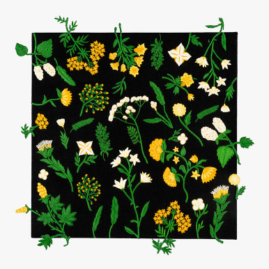 framed black canvas floral wall art in thread with bright yellow and white flowers and green leaves