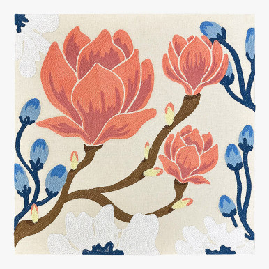 Feature image of a textile art featuring floral embroidery designs of Magnolias and small blue buds over a cream background