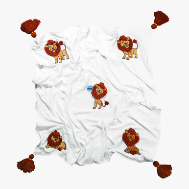 soft and cute lion blanket for kids featuring hand embroidered lions in five different poses over a white bamboo cotton fabric background