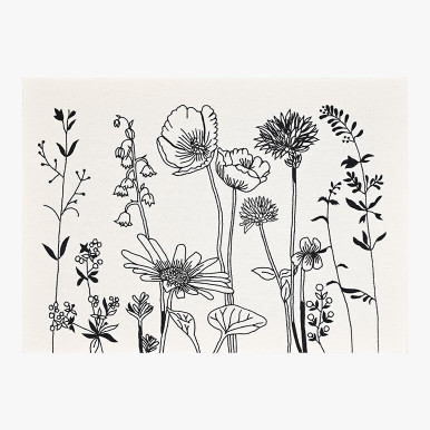 Monochrome floral wall art in cream and black featuring a group of wildflowers